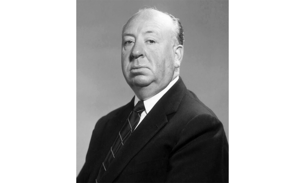 Studio publicity photo of Alfred Hitchcock