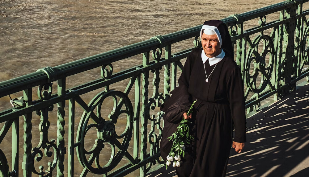 Nun on bridge