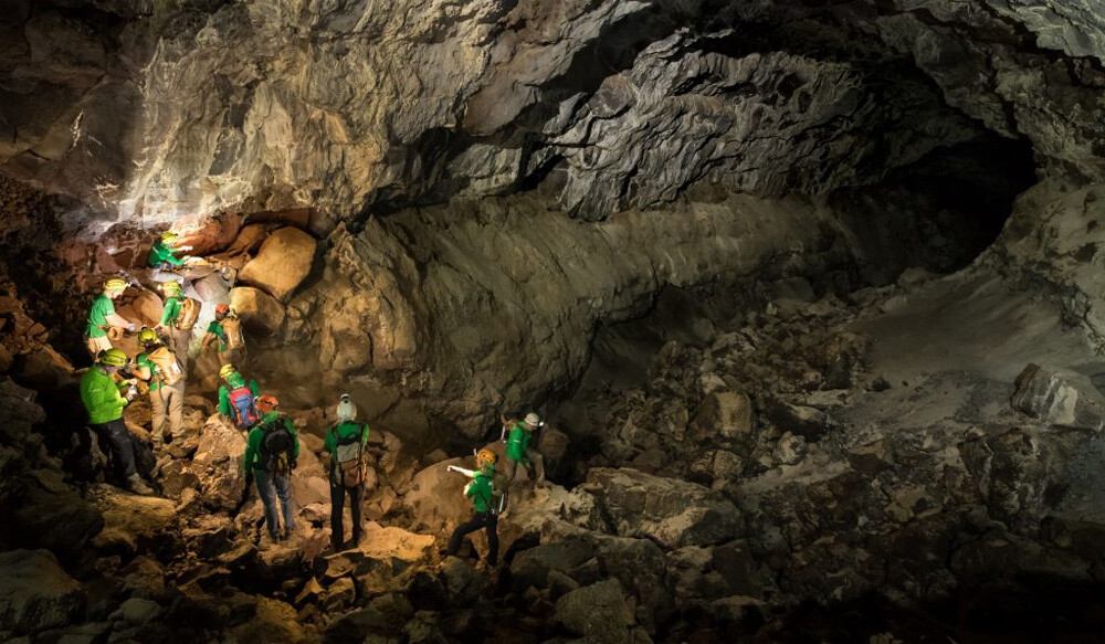 Collecting samples in a lava tube in Lanzarote, Spain