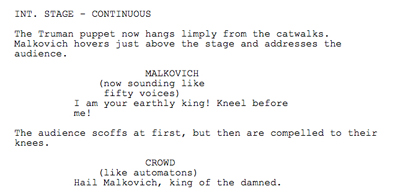 INT. STAGE CONTINUDIS The Tuman puppet from now hangs limply the catwalks. Malkovich hovers just above the stage and addresses the audience. MALKOVICH