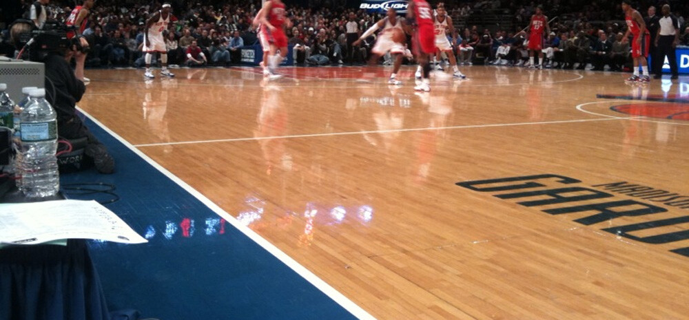Game between the New Jersey Nets and New York Knicks at the Madison Square Garden shot from courtside