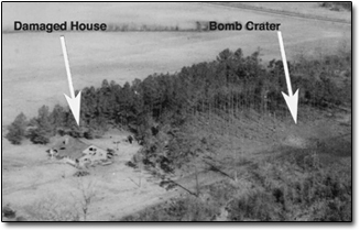 Cratere di una bomba domestica danneggiata