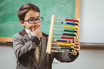 Behold, a child with an abacus as a metaphor for wealth disparities in America.