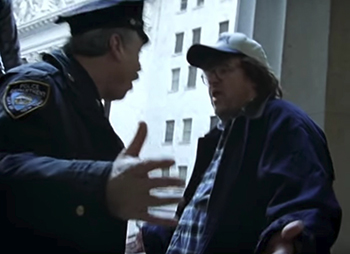 Michael Moore accosted by police
