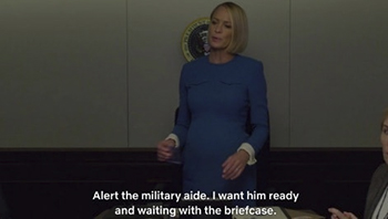 Alert the military. aide. 1 want him ready and waiting with the briefcase.