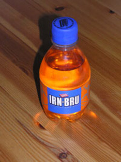 A photograph of the "with sugar" version of A.G. Barr's Irn-Bru softdrink.