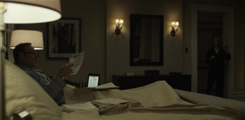 Frank reading in bed