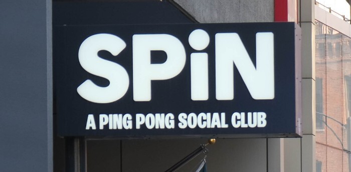 SPiN club sign