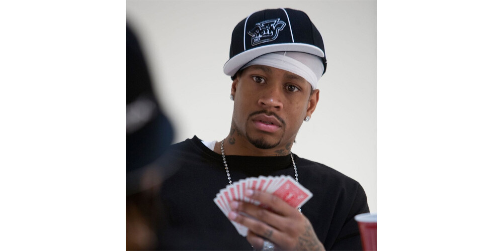 Philadelphia 76ers guard Allen Iverson playing cards