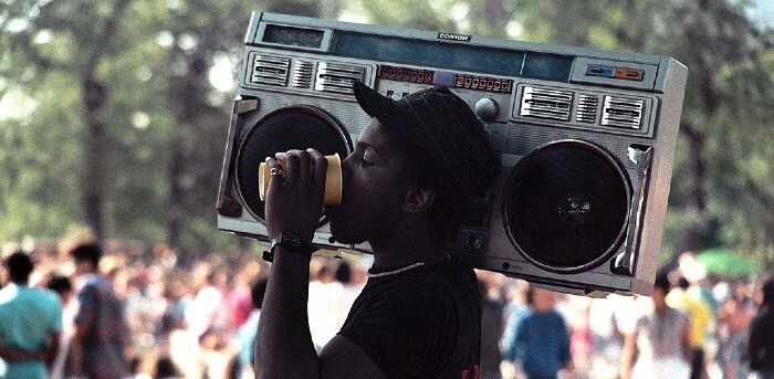 A man holding a boombox circa 1985