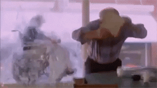 Wheelchair breaking through a window