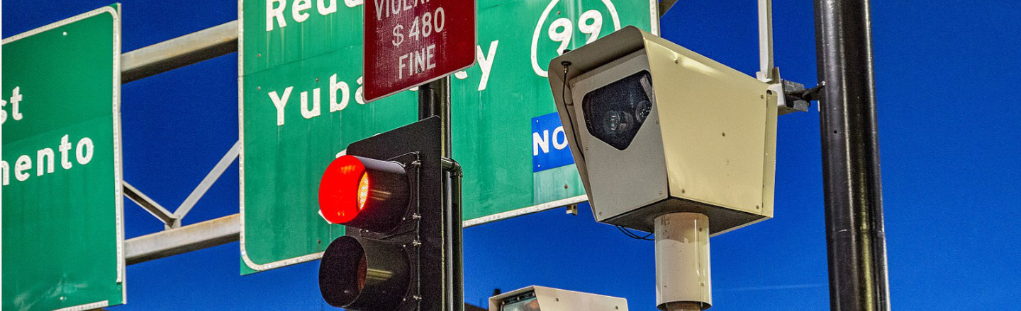 Red-Light Traffic Cameras Are In (Hooray) Trouble