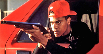 Lloyd Avery II holding a gun