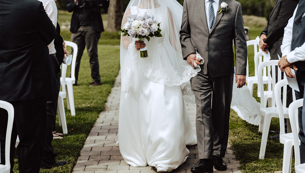 walking bride down the aisle