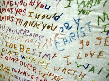 A piece of cloth embroidered by a patient suffering schizophrenia, demonstrating the nonsensical associations between words and phrases characteristic of thought disorder