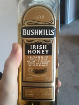 1608 BUSHMILLS IRISH HONEY A BLEND OF TREPLE DISTILLED IRISH WHISKEY. REAL IRISH HONEY AND OTHER NATUR AL FLAVORS WWAe hino FAO 0nt USLL CO ANYEM 14-