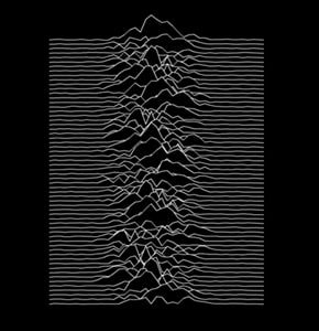 It’s an image of <A TARGET=_blank HREF=https://en.wikipedia.org/wiki/Unknown_Pleasures#Artwork_and_packaging>radio waves from a pulsar</A>. There, now you know more about this than 99 percent of people who own the shirt.