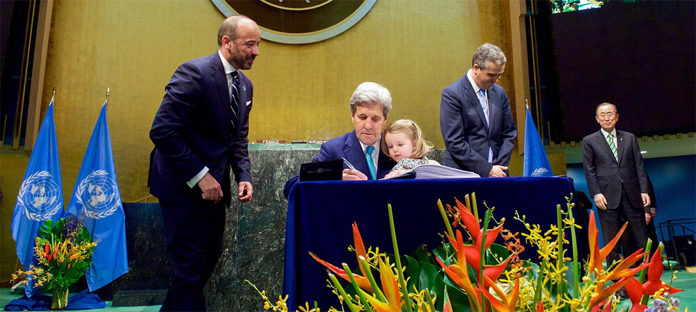 U.S. Secretary of State John Kerry signs the COP21 Climate Change Agreement on behalf of the United States