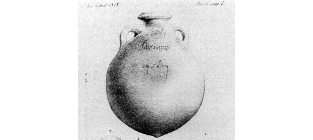 A Dressel 20 amphora with examples of tituli picti and potters' stamps found at Monte Testaccio