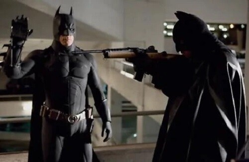 Batman and copycat in Christopher Nolan's The Dark Knight.