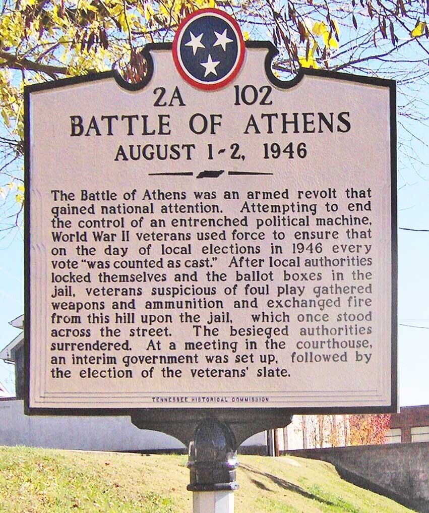102 2A BATTLE OF ATHENS AUGUST 1-2, 1946 The Battle of Athens was an armed revolt that Attempting to end gained national attention. the control of an entrenched political machine, World War II veterans used force to ensure that on the day of local in 1946 every vote was counted as cast. After local authorities locked themselves and the ballot boxes in the jail, veterans suspicious of foul play gathered weapons and ammunition and exchanged fire from this hill upon the jail, which once stood across the street. The besieged authorities surrendered. At a meeting in the courthouse, an