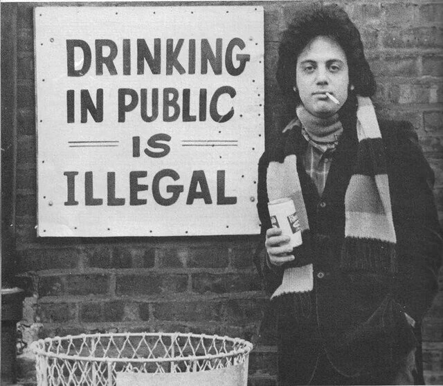DRINKING IN PUBLIC IS ILLEGAL