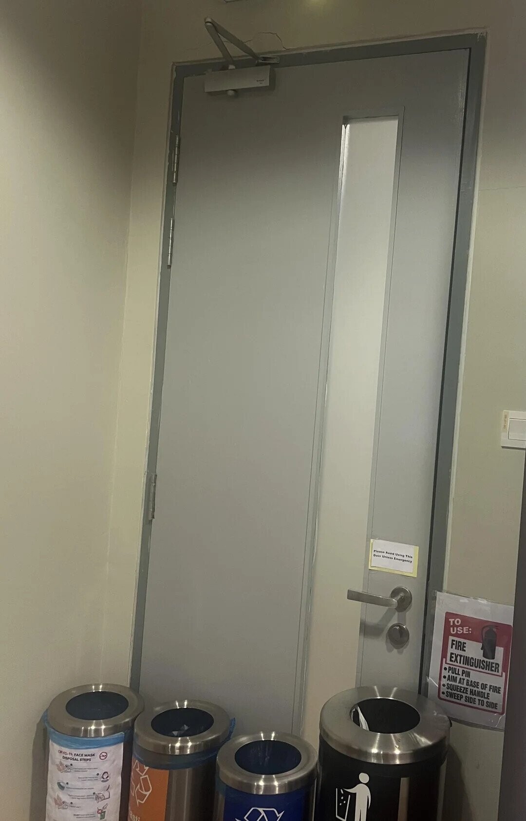 Please Avoid Using This Doer Unless Emergency TO USE: FIRE EXTINGUISHER PULL PIN AIM AT BASE OF FIRE SQUEEZE HANDLE SWEEP SIDE TO SIDE MASK DISPOSAL STEPS