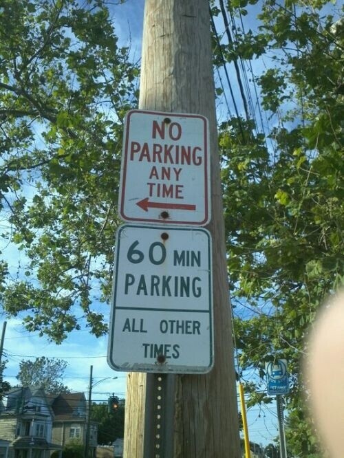 NO PARKING ANY TIME 60 MIN PARKING ALL OTHER TIMES TT