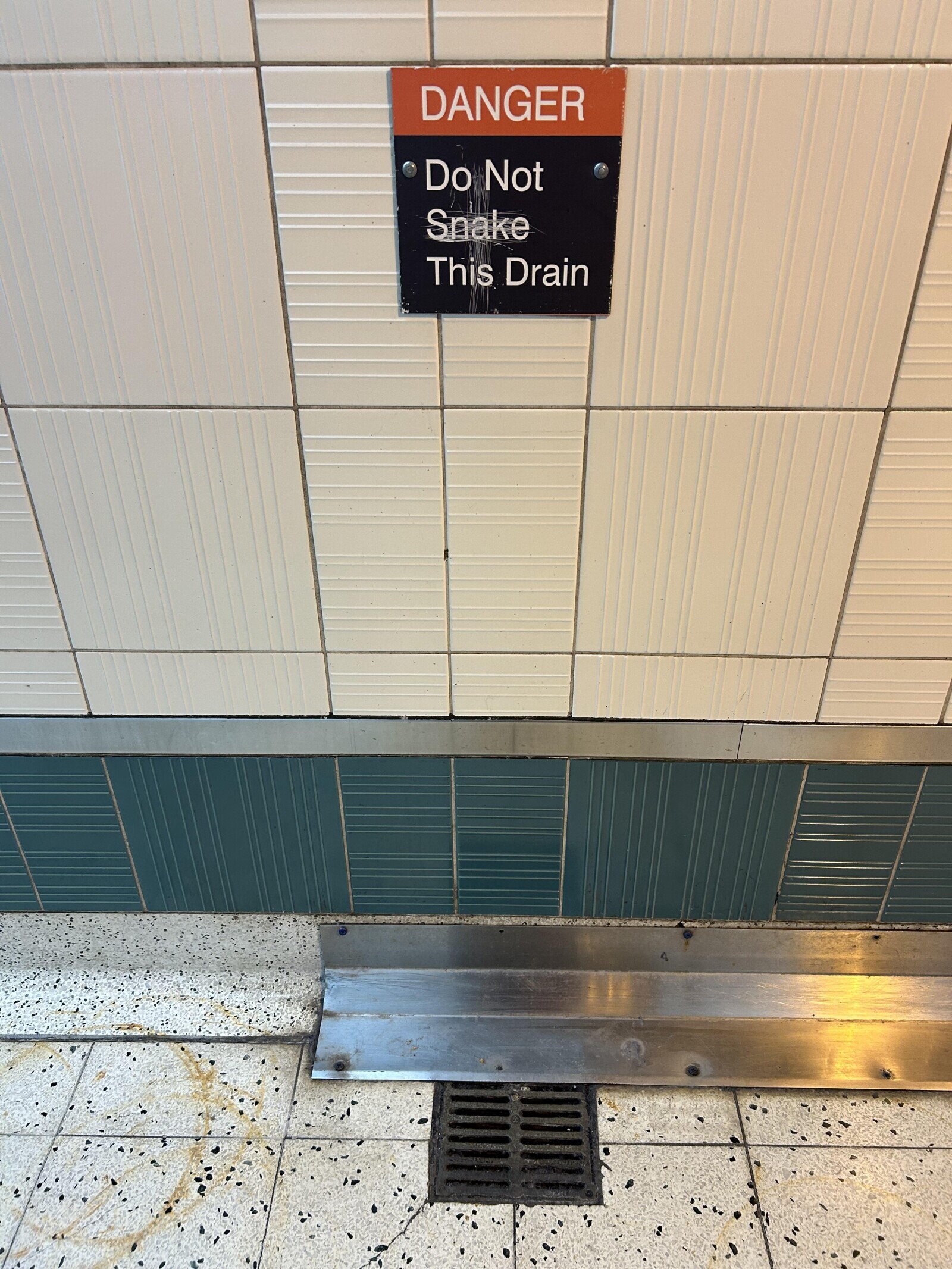 DANGER Do Not Snake This Drain