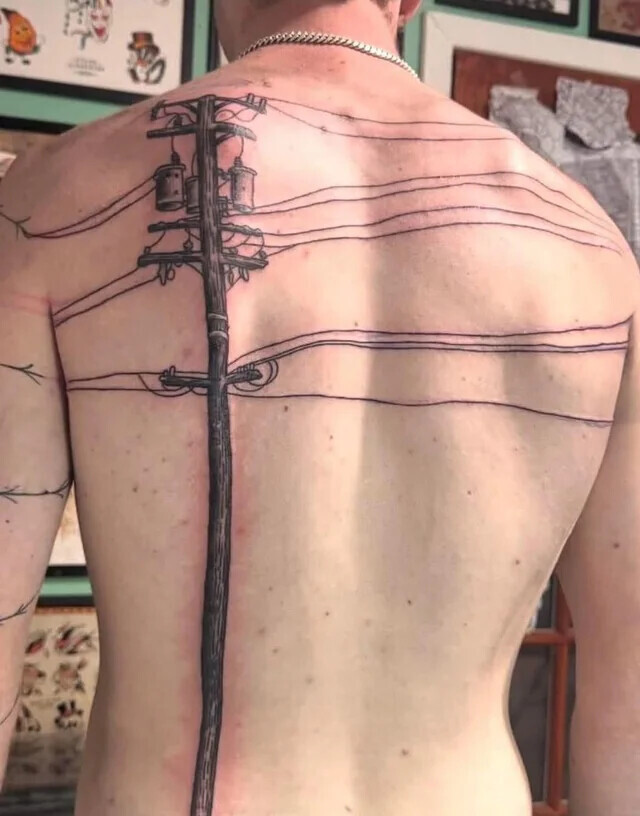 22 Tattoos We Just Can't Wrap Our Head Around