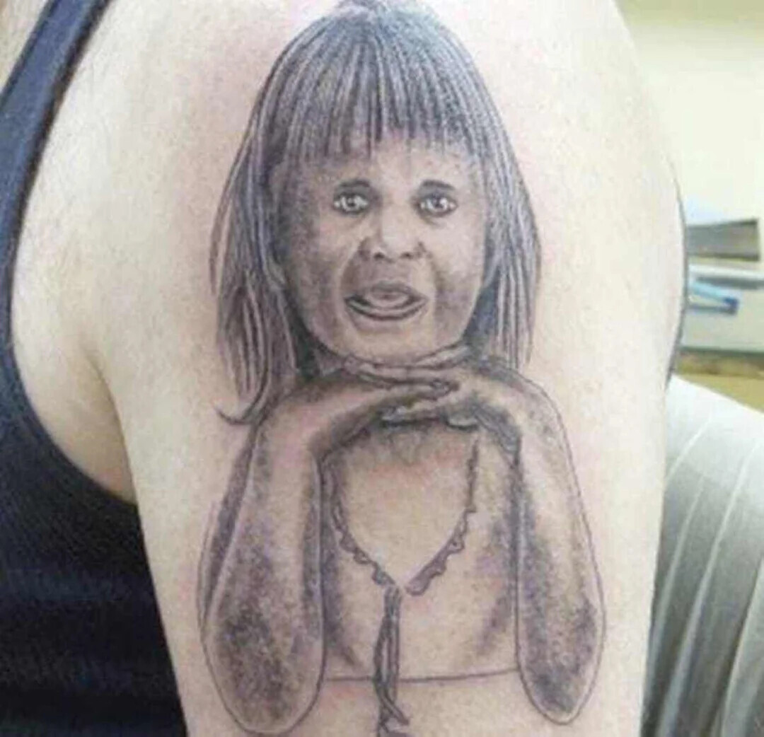 22 Tattoos We Just Can't Wrap Our Head Around