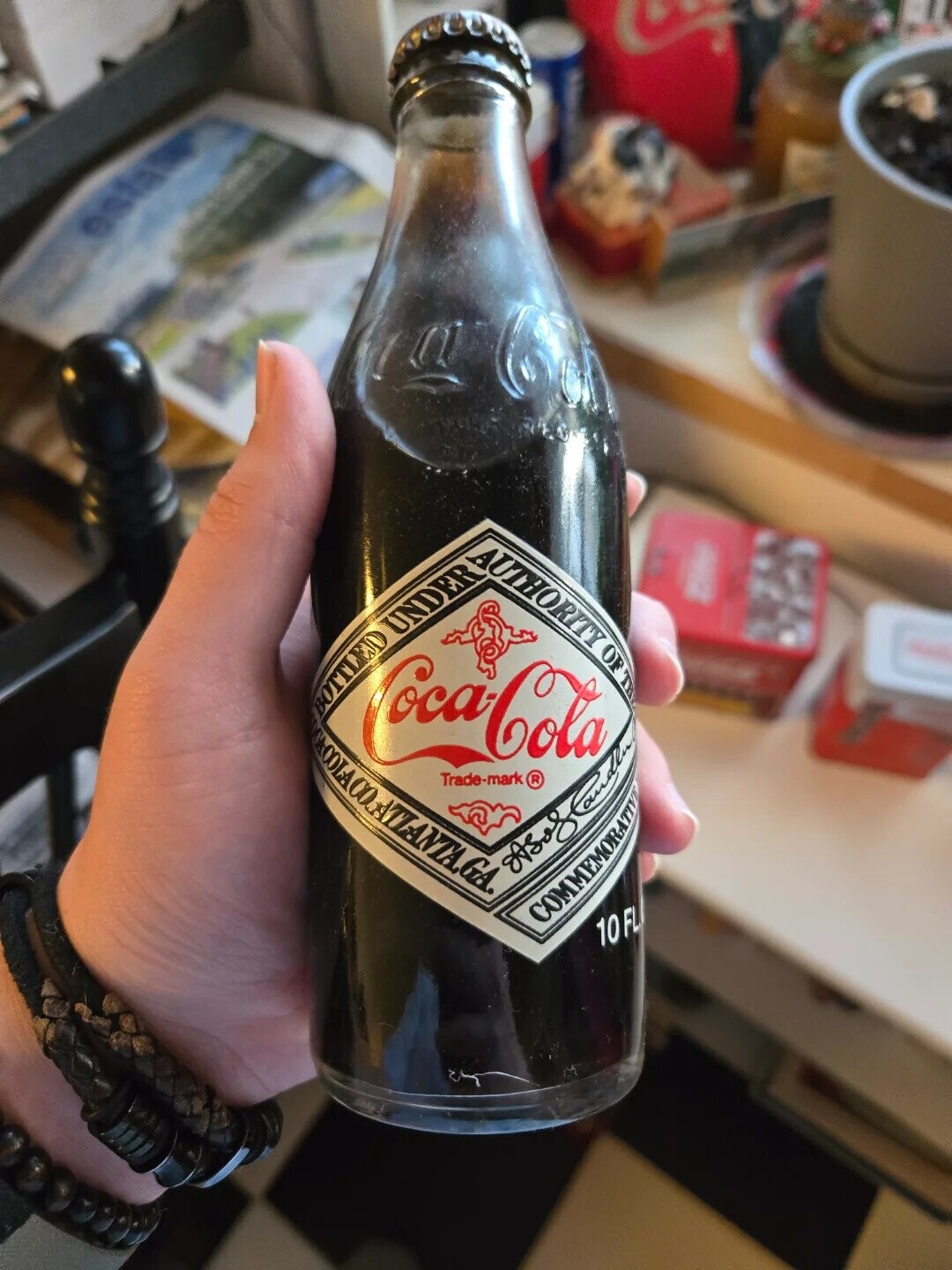 esta BOTTLED Coca-Cola Trade-mark OF ILLA ACQ ATLANTA,GA. COMMEMORATIVE 10 FL
