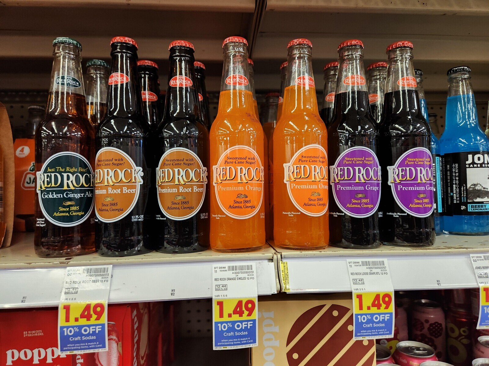 Enjoy injoy injos REDROC W ROCK REDRRCH RED ОС ReDROCK RE ROCK REDROCK B POCK RED Dock of Sweetened with Sweetened with Sweetened with Sweetened with Sweetened with Sweetened with Pure Cane Sugar! JON Pure Cane Sugar! Pure Cane Sugar! Pure Cane Sugar. Pure Cane Sugar! Pure Cane Sugar! CANE SUG Just The Right Bite! REDROO RED ROCK JA RED ROCK REDROG DROCK RED ROCK RED ROCK Premium Orang Premium Orange Premium Grape Premium Grap Premium Root Beer remium Root Beer Golden Ginger Ale Since 1885 Since 1885 Since 1885 Since 1885 Since 1885 5c REFUND-CT-OR-MI 10c REFUND FROM Brigham City UT NAME Since 1885 