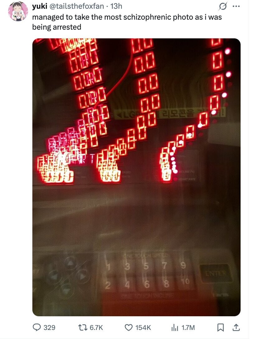 yuki @tailsthefoxfan 13h g ... managed to take the most schizophrenic photo as i was being arrested HEART RATE the TOUCH 7 9 5 1 3 US ENTER 10 6 4 2 the TOUCHANCUSE 329 6.7K 154K del 1.7M