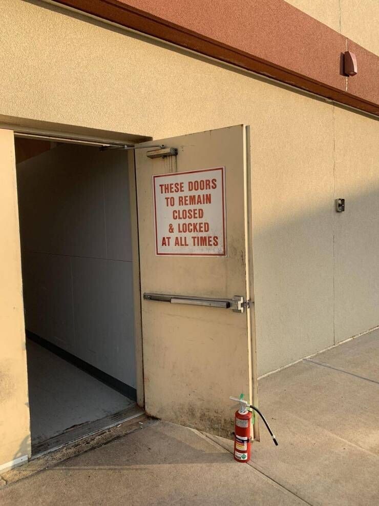 THESE DOORS TO REMAIN CLOSED & LOCKED AT ALL TIMES
