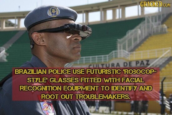 CRACKED.COM CULTURA DE PAZ BRAZILIAN POLICE USE FUTURISTIC 'RO3OCOP- STYLE' GLASSES FITTED WITH FACIAL RECOGNITION EQUIPMENT TO IDENTIFY AND ROOT OUT TROUBLEMAKERS. 2