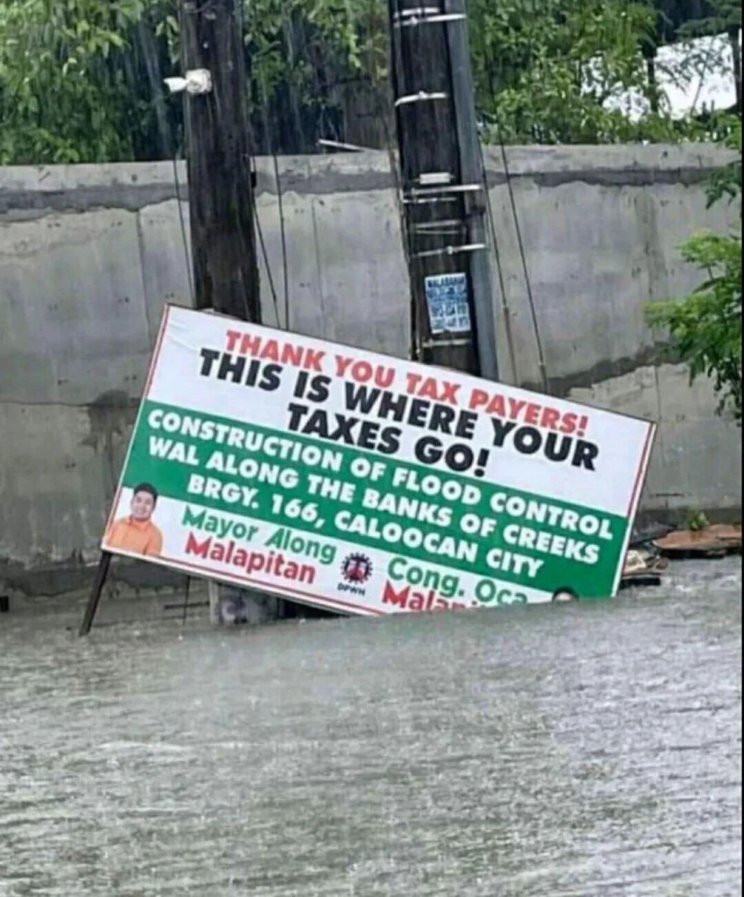 THANK YOU TAX PAYERS! THIS IS WHERE YOUR TAXES GO! CONSTRUCTION OF FLOOD CONTROL WAL ALONG THE BANKS OF CREEKS BRGY. 166, CALOOCAN CITY Cong. Oca Mayor Along Mala Malapitan DPWH