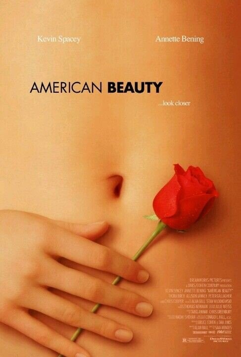 Kevin Spacey Annette Bening AMERICAN BEAUTY ...look closer DREAMINGRYS PICTURESPASSERS PRODUCTION KEVIN SPACEY ANNETTE BEMING MERCAN BEAUTY SHOPA BIREH ALUSON SARNEY PETERGALLAGHER MICONISCOOPER with ALAN SALL STAN WOOOKOWSK NEWMAN WEISS 320 ANWAE CHRIS GREENBURY 9035 HOLL AST Hing BRUCE COHEN ISAN ENIS ALAN BALL it SAM MENDES - OHK morals - - Dio WECH R the PICTURES