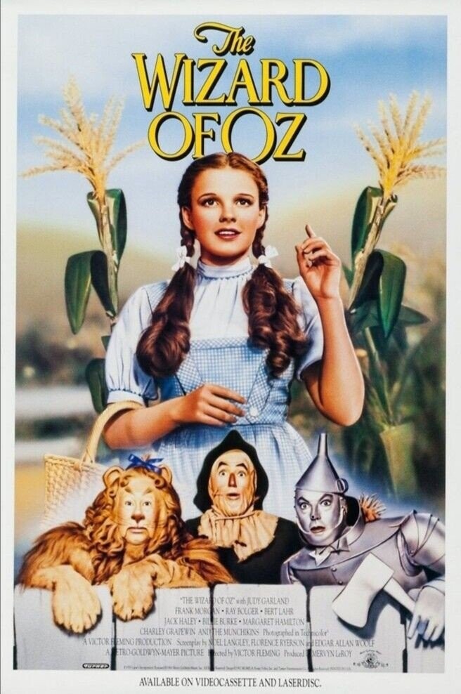 The WIZARD OFOZ THE WIZAKOOF OZ) with JUDY GARLAND FRANK MORGAN RAY BOLGER BERT LAHR JACK HALEY RIE BURKE MARGARET HAMILTON CHARLEY GRAPEWIN ANDITHE MUNCHIKINS Photographed in Technocolor A VICTOR FREMING PRODUCTION by NIDEL LANGLEY FLORENCE RYERSON in EDGAR ALLAN WOOLF A ETRO-GOLDRYN-MAYER PICTURE ecred by VICTOR FLEMING Produced MERVYNLeROY - TUPKEP 00 Smart - - - HE Sand AVAILABLE ON VIDEOCASSETTE AND LASERDISC.