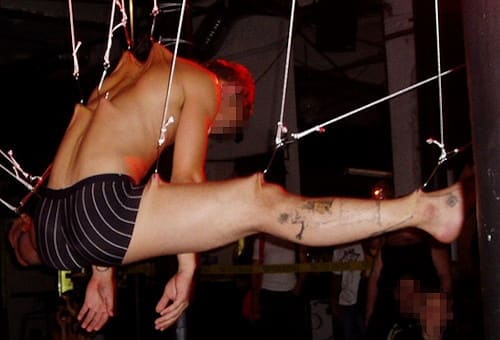 People Dangle Themselves From Skin Hooks (To Relieve Stress)