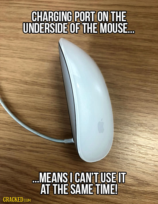 CHARGING PORT ON THE UNDERSIDE OF THE MOUSE... ...MEANS I CAN'T USE IT AT THE SAME TIME! 