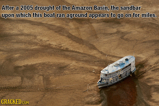 After a 2005 drought of the Amazon Basin, the sandbar upon which this boat ran aground appears to go on for miles. CRACKED CON 