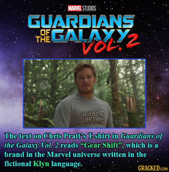 MARVEL STUDIOS GUARDIANS OF GALAXY THE VOl. 2 SEAAE BFE4 The text on Chris Pratt's T-shirt in Guardians of the Galaxy Vol. 2 reads Gear Shift, which