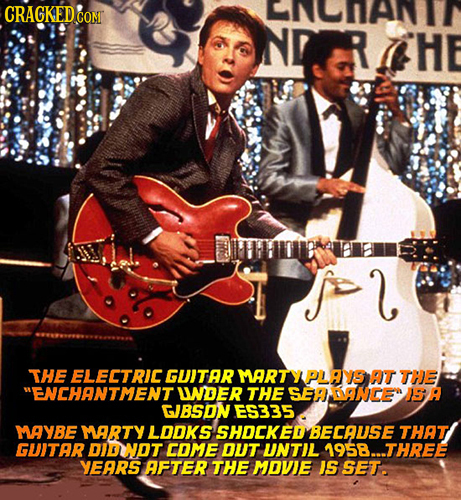 CRACKEDG COMr Na H f>l THE ELEETRIC GUITAR MART PLAYS AT THE ENCHANTMENT WWDER THE SEA DANCE 15 A GJBSON ES335 MAYBE MARTY LODKS SHOCKED BECAUSE THAT